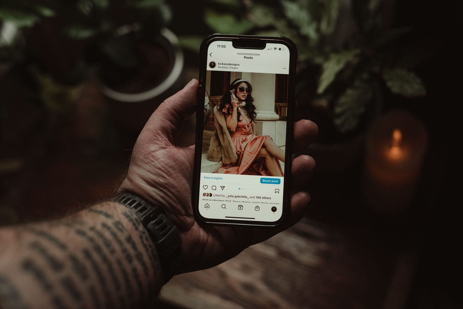 Content planning laid out beside a phone